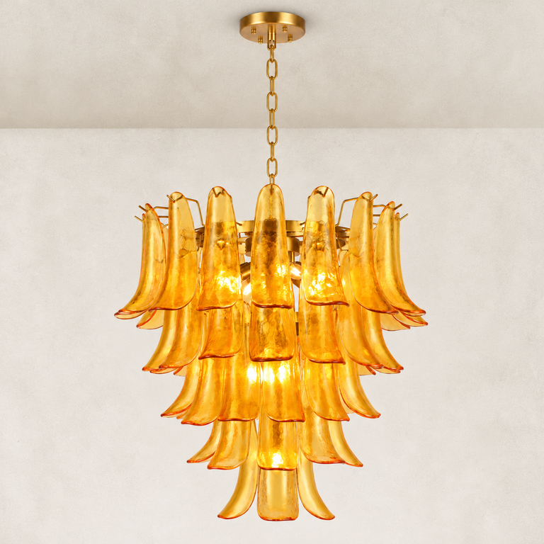 Illuminated tiered amber chandelier with curved panels and a gold-tone canopy.