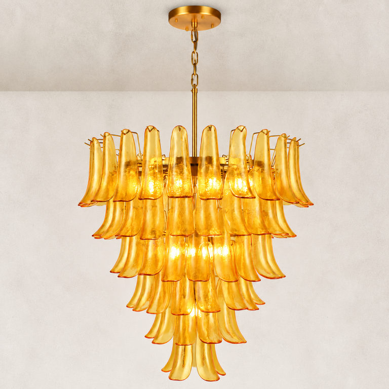 Large tiered amber chandelier with curved panels and gold-tone suspension.